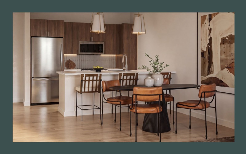 a kitchen with a table and chairs