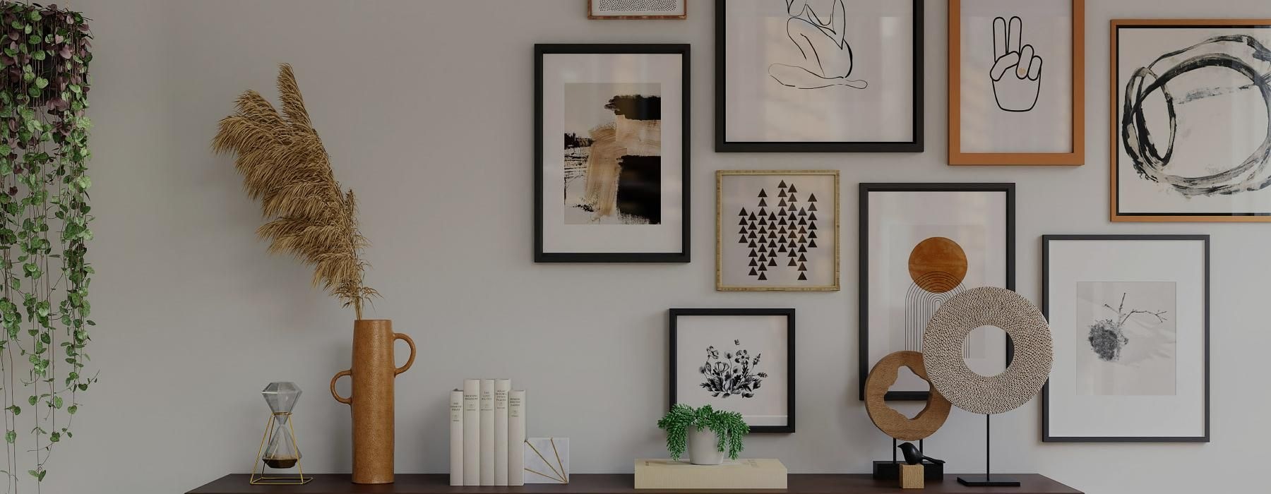 a wall with pictures and frames