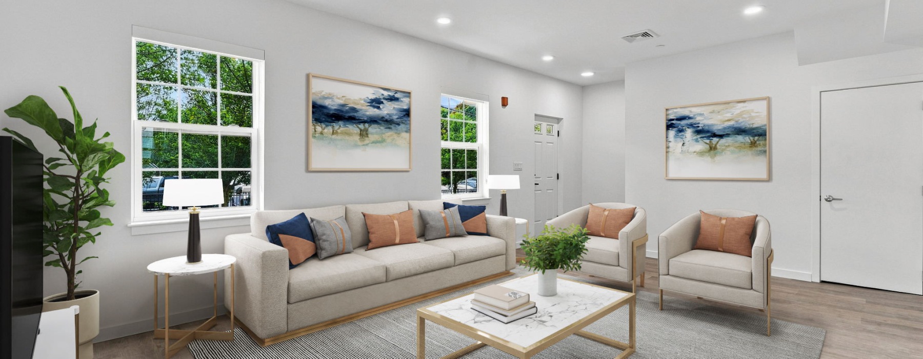 living room with furniture plants and windows