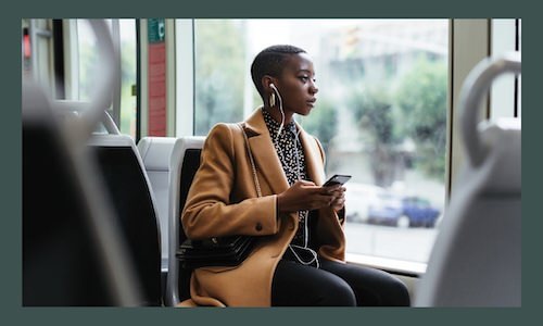 a woman sitting on a bus